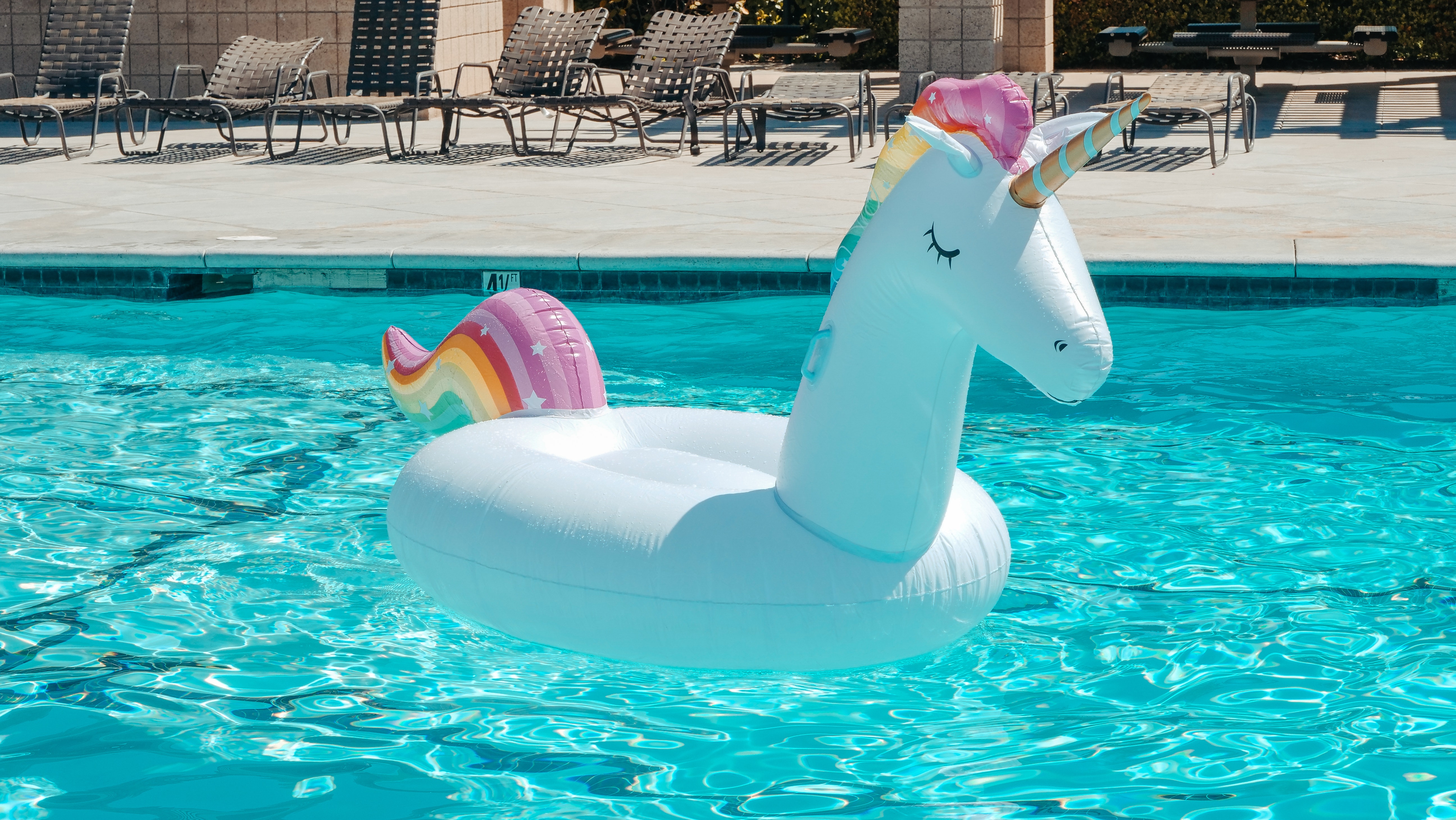 Floating Unicorn Tube in Pool