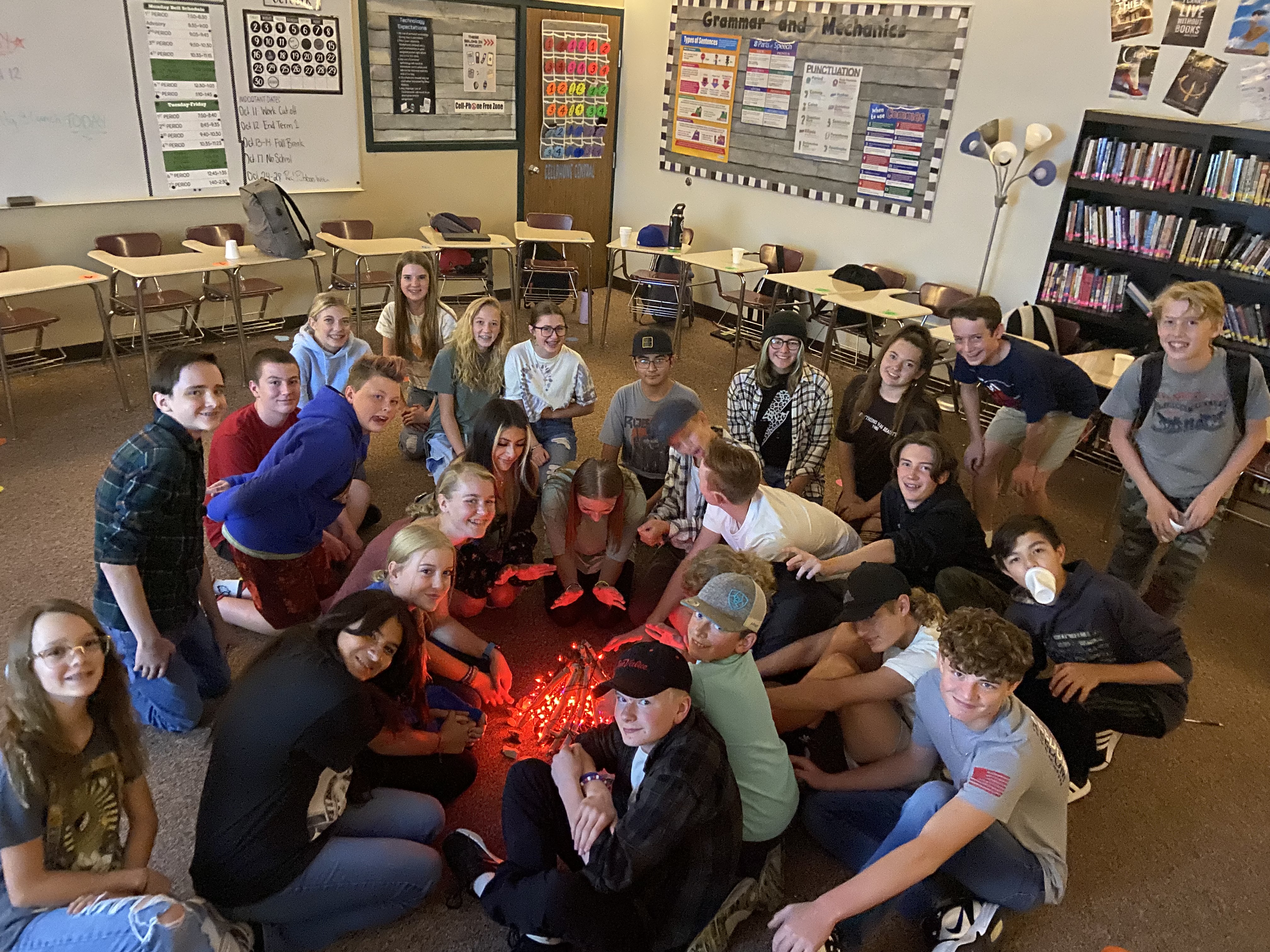 Students around campfire in language Arts class