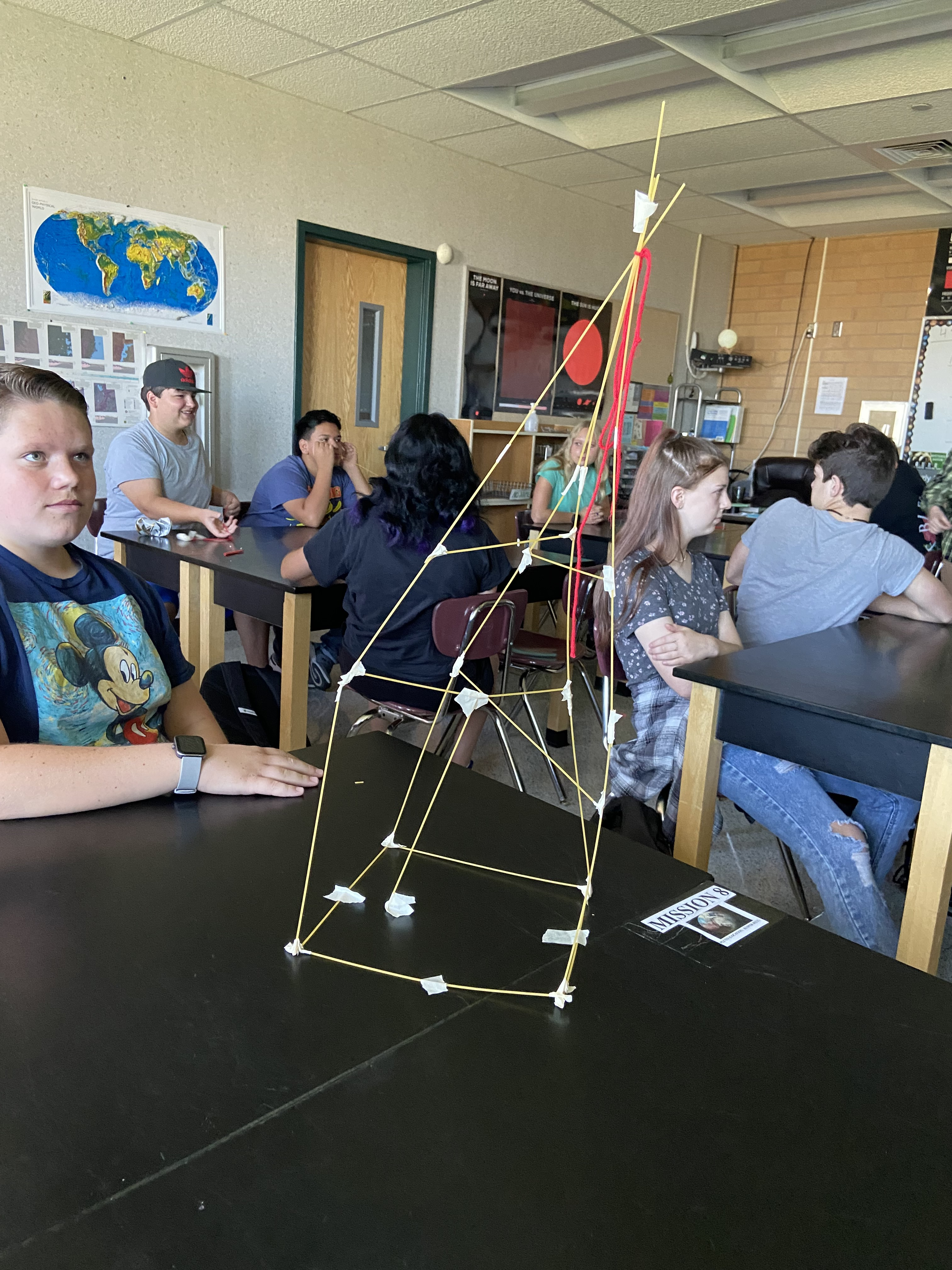 Students creating marshmallow structures in science