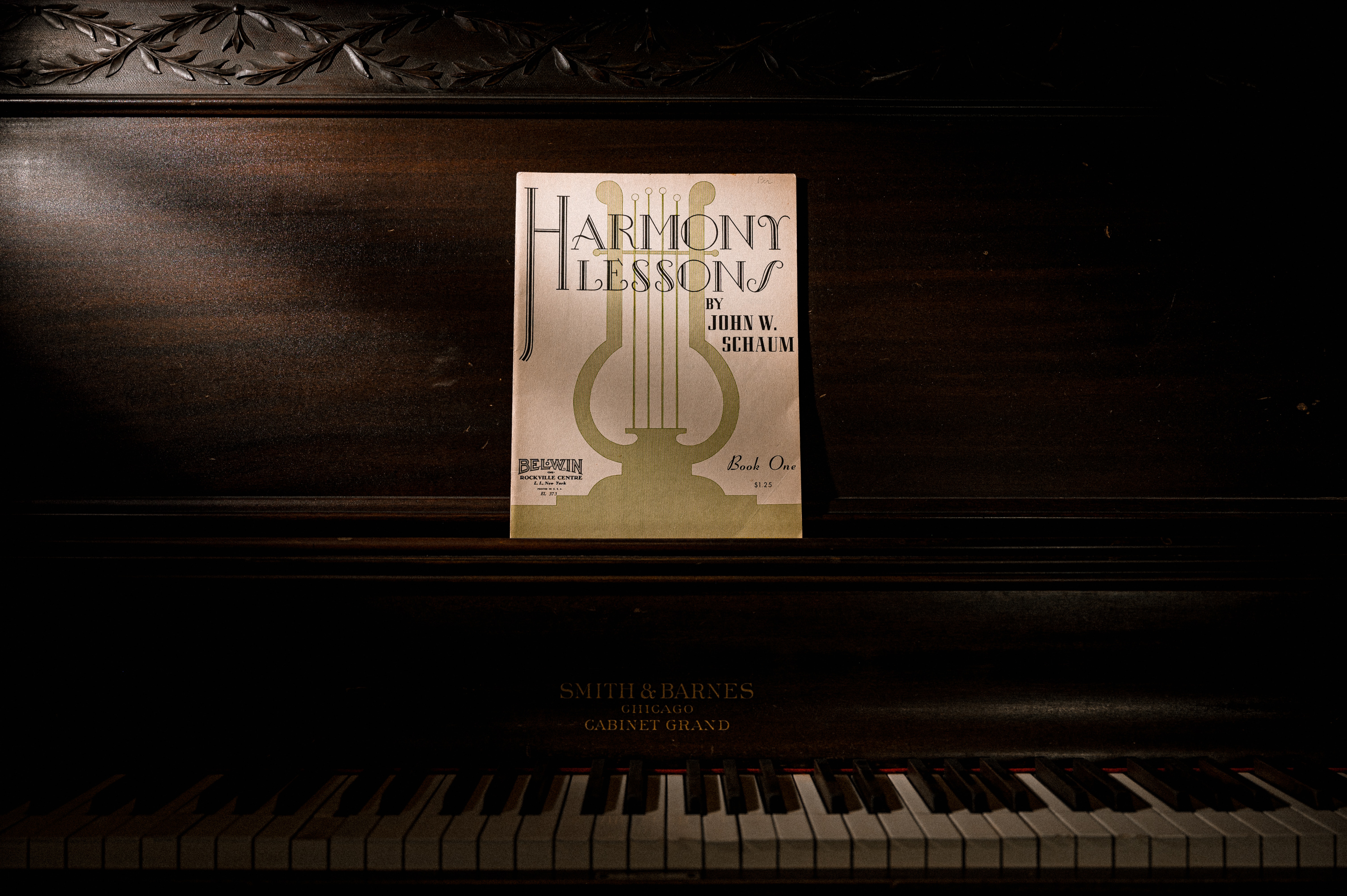Harmony Lessons sheet music on piano