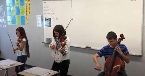 Students playing instruments in math class