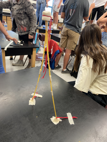 Students creating marshmallow structures in science