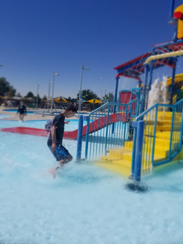 Students playing in the Payson Pool